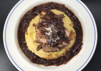 Lamb, porcini and polenta. Delicious pan fried lamb with porcini, rosemary soft polenta, and a beautiful rich onion and red wine sauce.